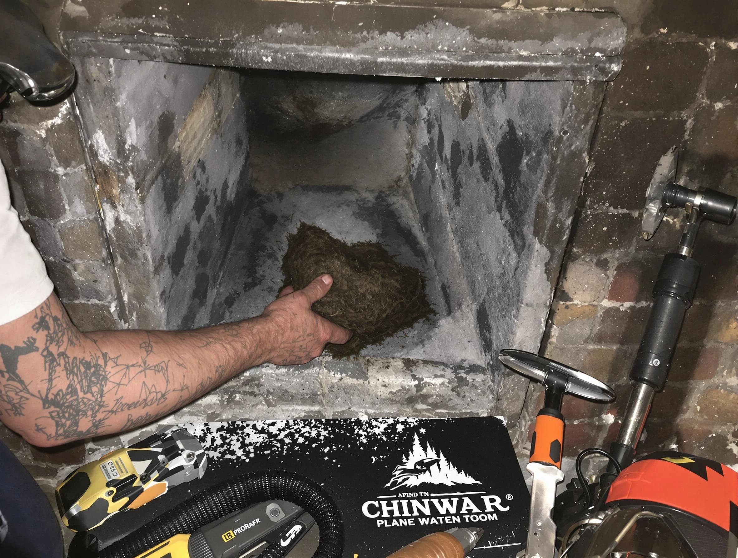 Laurel Chimney Sweep safely removing debris and screening chimney in Laurel, VA